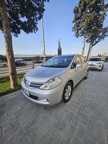 benzin bakı: Nissan Tiida: 1.6 l | 2008 il Sedan — 2