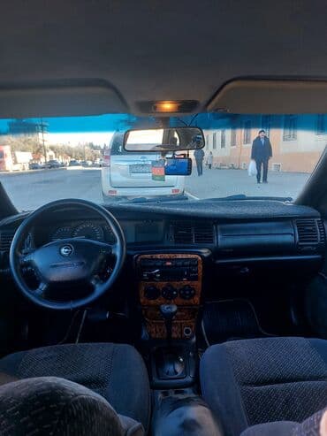 Audi: Opel vectira sedan - Kuzov: 4 qapılı sedan, göy rəng - Salon: parça — 1