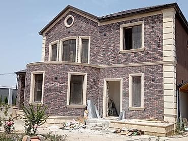 Fasad üçün dekorativ daş üzlük – qaya fakturalı klinker panellər -