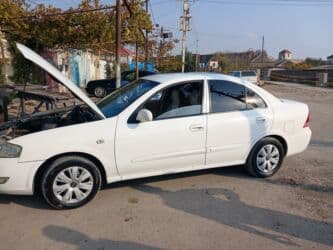 авто азербайджан: Nissan Sunny: 1.6 l | 2010 il Sedan — 6
