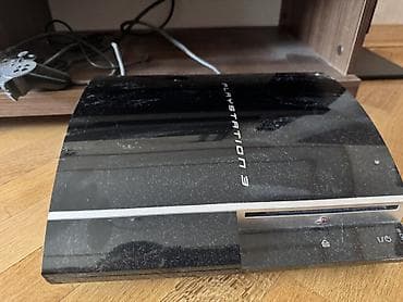 ps4 slim disk: PlayStation 3 oyun konsolu. Klassik qara korpuslu PS3 modeli olub — 1