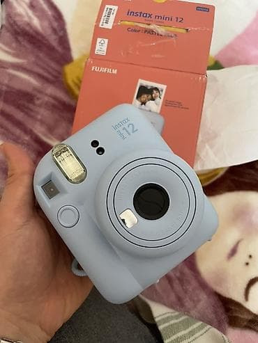 plyonka satisi: Fotoaparat yenidir, işlənilməyib . Üzərində 30 manatlıq 10-lu kağız — 2