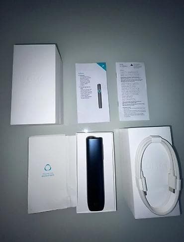 IQOS ILUMA cihazı – tam komplekt Xüsusiyyətlər: - Tütün çubuqları
