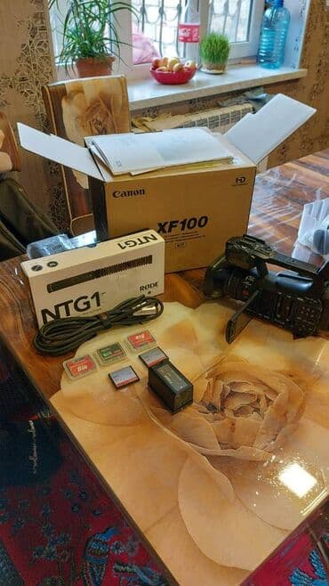 ses yazan cihaz: Canon XF100 və aksesuarları: Əlavə tripod, Əlavə yaddaş kartları(3 — 9