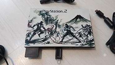 ps 4 diskləri: Playstation 2 əla vəziyətdə disk yeri ləğv edilib praşifkalıdı oyunlar — 4