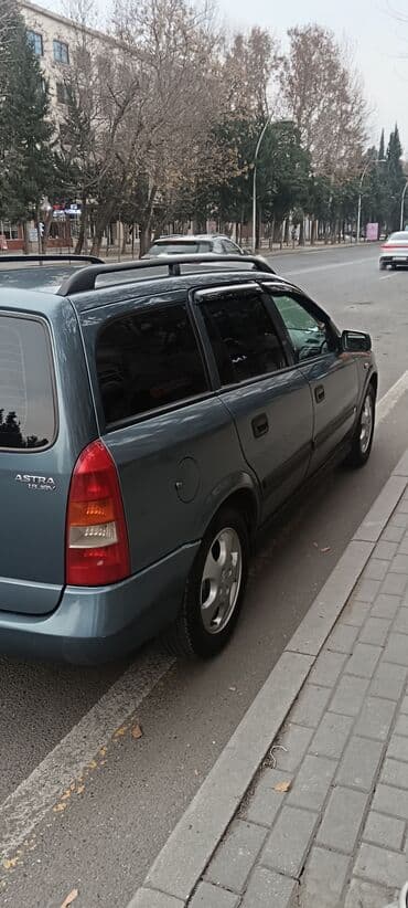 qaz 53 su: Opel Astra: 1.6 l | Universal — 3