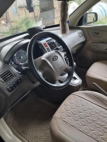 opel astra k: Hyundai Tucson: 2.7 l | 2006 il Ofrouder/SUV — 2