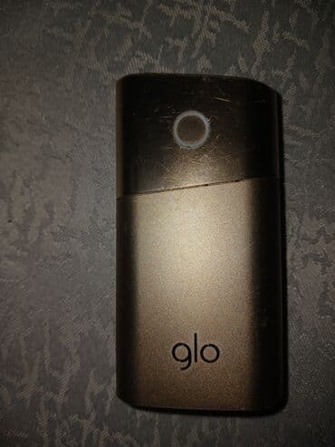 Toy paltarları və aksesuarları: Glo tütün qızdırma cihazı - Brend: glo - Korpus rəngi: bronz/qızılı — 1