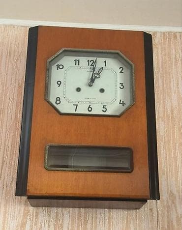 Divar saatları, Mexaniki, Mayatnik