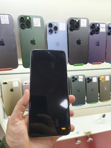 isdenmis telefonlar: Infinix smartfon - Rəng: ağ (parlaq arxa panel, Infinix loqosu) - — 2