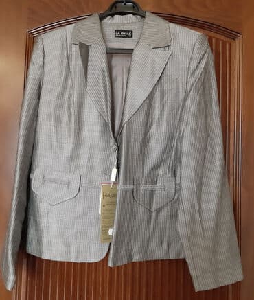 topik geyim: Qadın kostyumu. 44 və 48 razmerləri qalıb. Yenidir. Türkiyə — 1