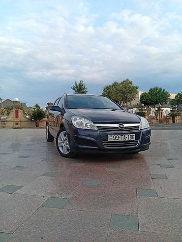 winda teker evi: Opel Astra H Caravan (universal kuzov) - Kuzov: universal, 5 qapı - — 1