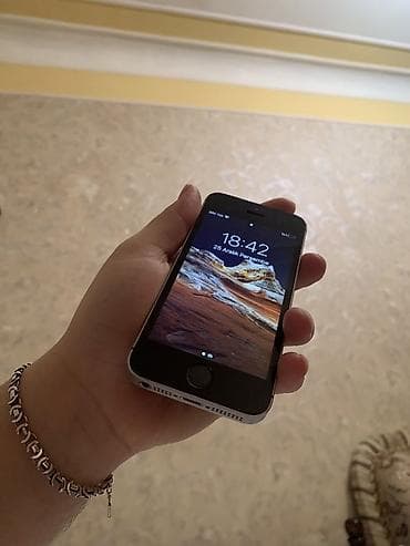ayfon 7s: IPhone SE, Gümüşü, Barmaq izi — 1