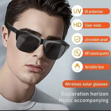 Daxili qulaqlıqlar və mikrofonla təchiz edilmiş bu qara ağıllı