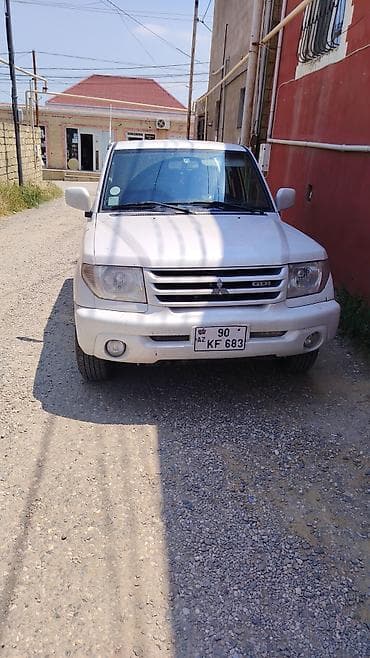 mitsubishi eclipse: Mitsubishi Pajero iO (GDI) – ağ rəngli, 5 qapılı yolsuzluq/siti — 1