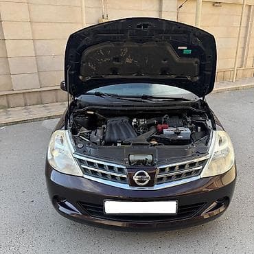 vaz on şuşə: Nissan Tiida: 1.5 l | 2011 il Hetçbek — 6