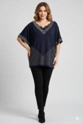 atlas köynəklər: 44 ölçüdür.Qadın bluzası – tünd göy rəngdə, V formalı yaxa dizaynı — 2