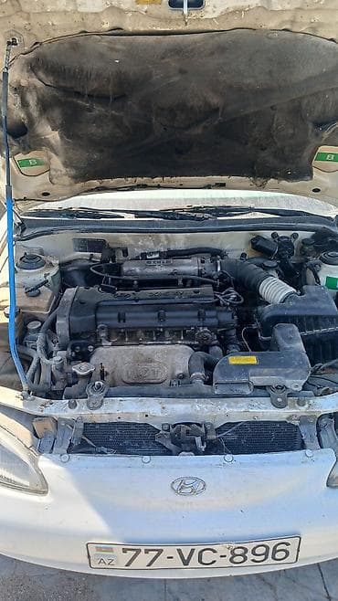 benzin filter: Hyundai Elantra: 1.6 l | 1998 il Sedan — 5