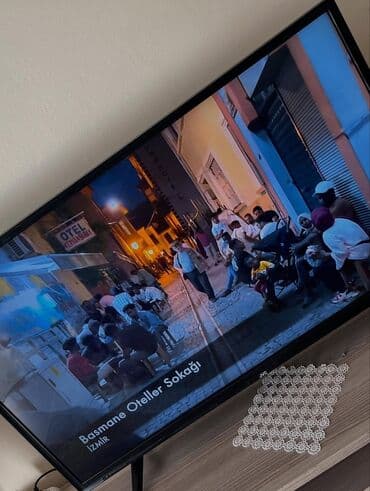82 ekran smart tv wifi: Ekranın sol tərəfində "Uygulamalar", "YouTube" və "Netflix" kimi — 4