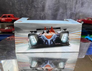 где можно продать марки: Коллекционная модель Aston Martin AMR-One #7 Gulf Team LeMans 2011 — 3