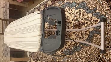 lovhə satılır: Ütü madası satılır Zolaqlı ağ parça örtüyü olan yığcam ütü masası. Bu — 4