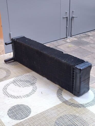 электрическая печка: Gaz 21 peçin radiatoru — 1