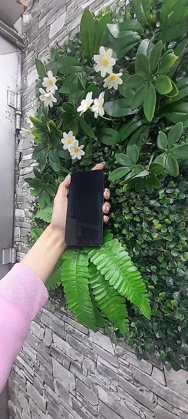 nokia e 72: IPhone 13, 128 GB, Qara, Face ID — 6