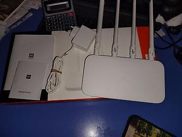 mi fi: Xiaomi Mi Router 4C – sürətli və sabit ev Wi‑Fi şəbəkəsi üçün. Yenidir — 4