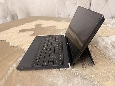 Digər noutbuklar və netbuklar: Microsoft Surface planşet-noutbuk hibridi Xüsusiyyətlər: - Ekran — 9