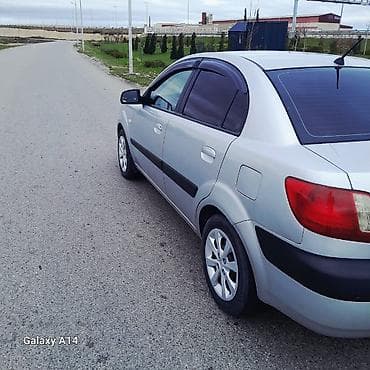 212 avtomobil: Kia Rio: 1.5 l | 2006 il Sedan — 6