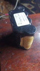 stol ustu qelyan: NiMH (Nikel-metal hidrid) batareya paketiidir. Üzərindəki etiketə — 1