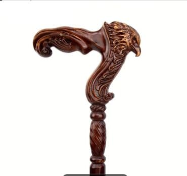 Yerimək üçün arabalar, çəliklər, əsalar, rollatorlar: Qartal başı dizaynlı, qəhvəyi rəngdə əsa. Əsanın tutacağı qartal başı — 2