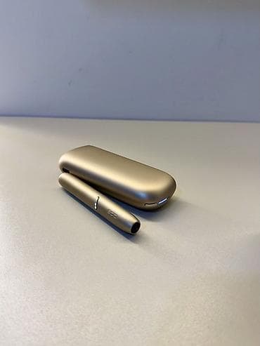 qizil sepler: IQOS cihazı – tütün qızdırma sistemi Məhsulun tərkibi: - Qızdırıcı — 1