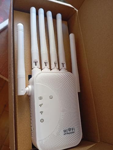 Modemlər və şəbəkə avadanlıqları: Wi‑Fi AP/Repeater – simsiz siqnal gücləndirici və giriş nöqtəsi — 1
