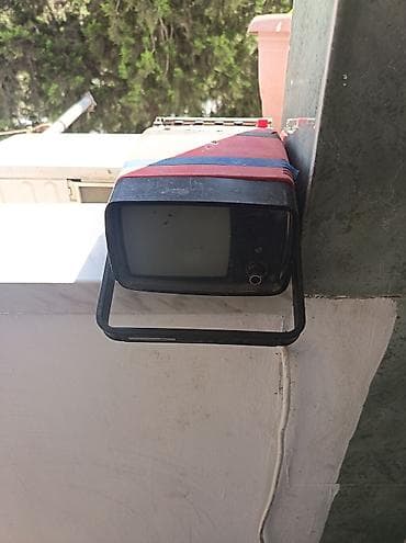 Televizorlar: Kompakt vintage cib televizoru və radio kombosu - Portativ dizayn — 1
