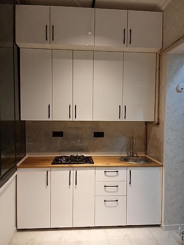 Ağ rəngli, kompakt mətbəx mebeli dəsti - Üst və alt bölmələrdən lalafo.az -da Ağ rəngli, kompakt mətbəx mebeli dəsti - Üst və alt bölmələrdən