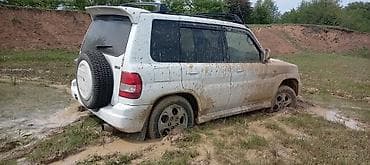 Nəqliyyat: Mitsubishi Pajero: 1.8 l | 1999 il 30000 km Sedan — 6