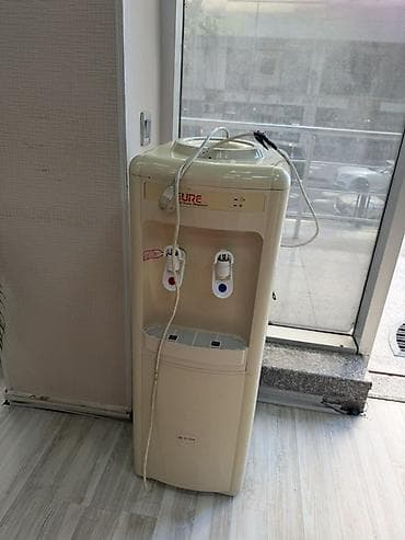 Su paylayıcısı (dispenser) - Brend: Sure (üst paneldə “SURE” yazısı) lalafo.az -da Su paylayıcısı (dispenser) - Brend: Sure (üst paneldə “SURE” yazısı)