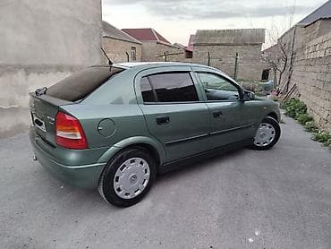 formula tekerler: Opel Astra: 1.8 l | 1999 il 250000 km Sedan — 2