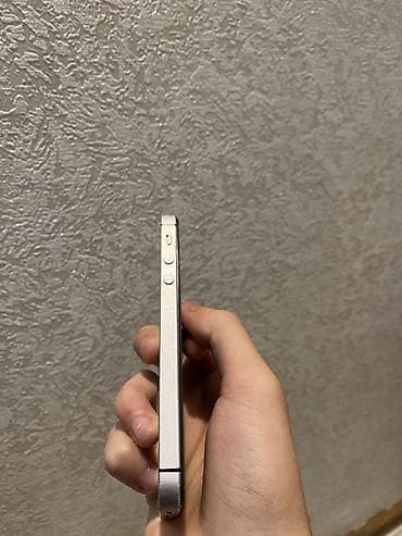 iphone 6s almaq bu: IPhone SE, 32 GB, Gümüşü — 6