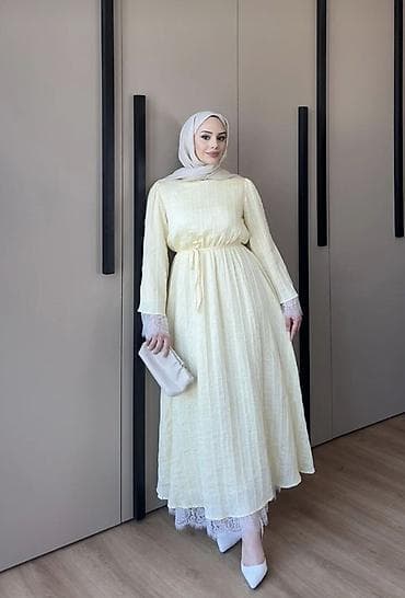 qol saatlari: Təzə Zərif pastel-sarı rəngdə, uzun fason hicab uyğun abaya/paltar — 1