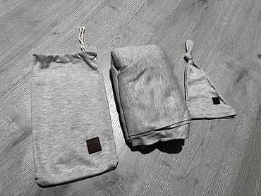 Boz rəngli trikotajdan uşaq daşıyıcı dəsti: - Dəst tərkibi: yumşaq