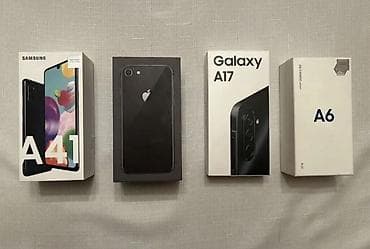 Müxtəlif model mobil telefonların qutulu seti. Paketdə görünən