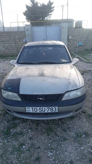 ZAZ: Model: Opel Vectra B sedan Rəng: gümüşü (qara kapot və sağ ön qanad) — 1