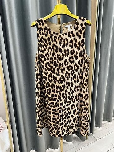 Leopar naxışlı qadın paltarı

-