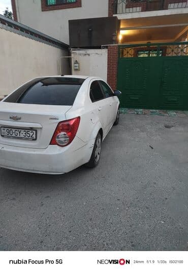 fiat doblo ölüxana: Chevrolet Aveo: 1.4 l | 2013 il Sedan — 1