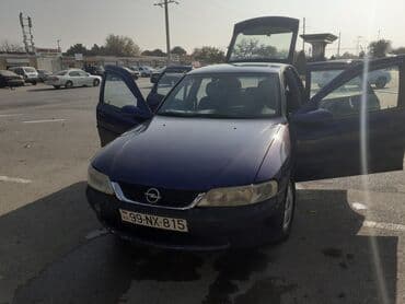 kia optima baku: Opel sedan Xüsusiyyətlər: - Kuzov: sedan, tünd mavi rəng - Markanın — 1