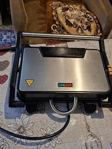 ucuz modem: Elektrik tost/sandviç presi aparatı satılır. İstəyən əlaqə saxlasın — 7