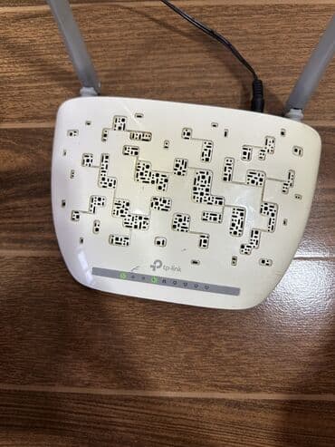 modem fiber optik: TP-Link simsiz marşrutlaşdırıcı, evdə və ya kiçik ofisdə internet — 2