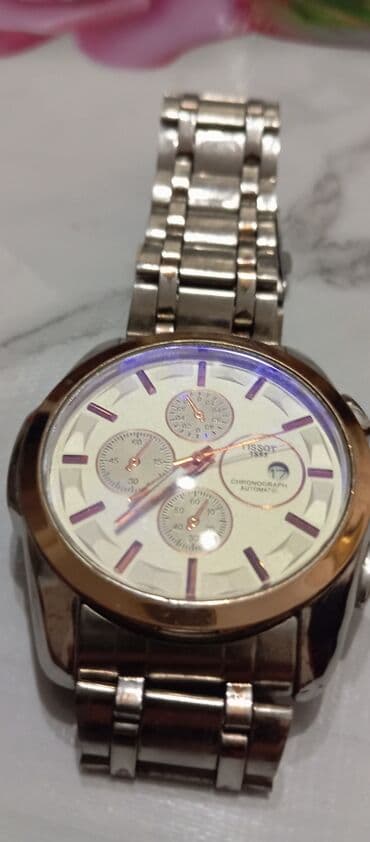 moskva univermagi qızıl saatlar: Qol saatı, Tissot — 1